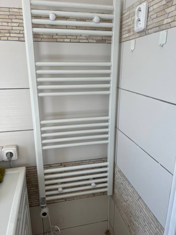 Heated towel rail mounted